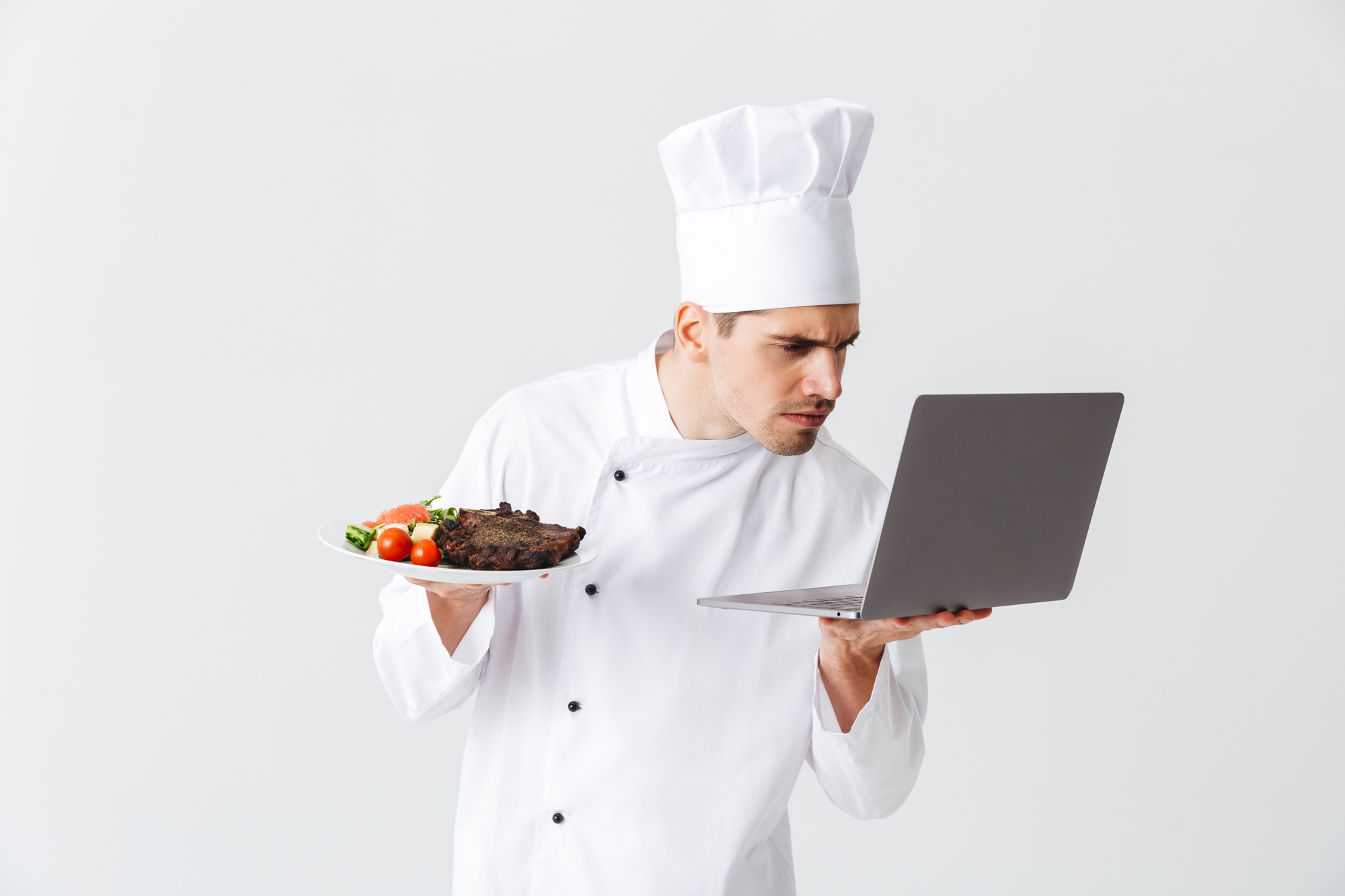 Instructor demonstrating plating on laptop